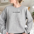 Detail of grey crewneck sweatshirt with black 'you are enough' slogan print - S / Gray