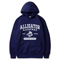 Detail of the white alligator graphic and varsity text on the navy blue hoodie - Navy Blue