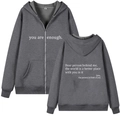 Detail view of the deep gray zip-up hoodie featuring white slogan print and size L label - S / Dark Gray