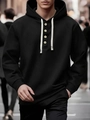 Detailaufnahme des schwarzen Herren-Hoodies mit Henley-Ausschnitt, Knöpfen und Kordelzug - S / Schwarz