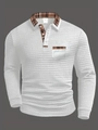 Detail of waffle knit fabric and classic brown plaid trim on white polo shirt pocket - S / White