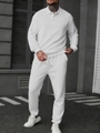Dettaglio del set polo bianco da uomo con texture del tessuto a spina di pesce premium - S / Bianco