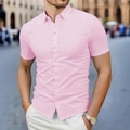 Close-up of slim-fit pink short sleeve shirt with classic collar and matching buttons - S / Pink
