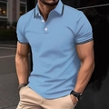 Detail shot of light blue polo shirt collar featuring black stripe trims and three buttons - S / Tops / Blue