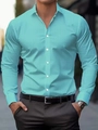 Detail of teal long sleeve slim fit shirt featuring subtle checkered texture and white buttons - S / Tops / Green (ACS30)