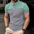Detail of men's polo shirt featuring mint green and grey color block with three buttons - S / Tops / Light Green