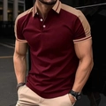 Detail of burgundy polo shirt with khaki patchwork and white buttons on men's top - S / Tops / Red