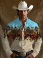 Dettaglio camicia western da uomo con stampa etnica blu e doppie tasche a contrasto - S / Azzurro Patchwork Etnico (B-141-2)