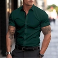 Close-up of slim fit short sleeve shirt with contrast black trim and dark green fabric - S / Tops / Dark Green