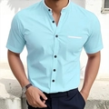 Close-up of mint blue shirt with mandarin collar, black buttons and chest pocket detail - S / Sky Blue