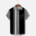 Detail view of men's color-block striped shirt with a functional front chest pocket - Black/Dark Grey/Light Grey Color Block