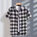 Detail of a plaid short-sleeve shirt with cotton lining on a wooden hanger with shadows - 3XL / Tops / Black and White Plaid (BDS20)