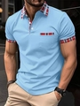 Men's light blue short sleeve polo shirt with red plaid patchwork collar and pocket detail - S / Blue