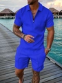 Detailed view of men's blue short sleeve polo set with textured geometric knit fabric - S / Top And Bottom / Blue
