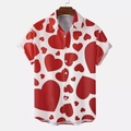 Detailed view of casual short sleeve shirt with vibrant red heart print and wood hanger - S / Tops / HJT46