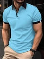 Close-up of men's blue polo shirt featuring black contrast collar and striped sleeve cuffs - M / Blue