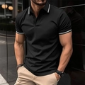 Close-up of black men's polo shirt with white stripe trim on ribbed collar and cuffs - S / Black