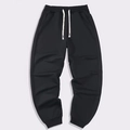 Pantalones deportivos negros para hombre con cintura elástica con cordón y puños de canalé - S / Negro