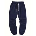 Detail of navy blue joggers showing elastic waistband with contrast white drawstrings - S / Navy Blue