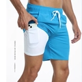 Détail du short de sport 2-en-1 bleu pour homme avec poche intérieure pour téléphone - XS / Bleu ciel