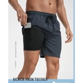 Vue détaillée du short de plage 2 en 1 avec doublure de compression et poche téléphone - XS / Gris clair