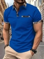 Detailansicht des blauen Poloshirts mit Karokragen und Taschendetails auf Außenhintergrund - S / Königsblau