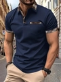Detail eines dunkelblauen Slim-Fit-Poloshirts mit Karomuster an Kragen und Brusttasche - S / Marineblau