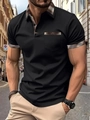 Detail eines schwarzen Herren-Poloshirts mit modischem Karomuster an Kragen und Ärmelbündchen - S / Schwarz