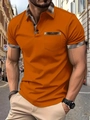 Detail of orange men's polo shirt featuring plaid pattern accents on collar and pocket - S / Orange