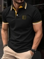 Close-up of black polo shirt featuring yellow-white striped collar and Brooklyn embroidery - S / Black (Letter B Style)