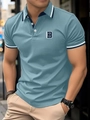 Detail of slim-fit men's polo shirt with Brooklyn patch and ribbed stripe collar - S / Blue (Letter B Style)