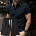 Dettaglio polo blu navy con bordo bianco e pantaloncini neri con coulisse uomo - S / Navy+Nero