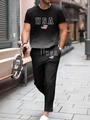 Action shot of men's black 2-piece summer set with USA flag and text graphic - S / Black Grey Gradient