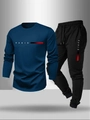 Detail of navy long sleeve t-shirt and black joggers set with Paris graphic print - S / Blue + Black