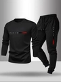 Detail of black sports set with PARIS lettering and drawstring waistband on joggers - S / Black + Black