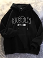 Flat lay of black hoodie with white Boston print on textured newsprint background - S / Tops / Black