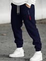 Detail of navy joggers showing white BALANCE lettering and elastic ribbed cuffs - S / BALANCE Print-Navy Blue