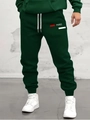 Détail du jogging homme vert foncé avec imprimé logo Paris et chevilles élastiquées - XL / Impression Paris-Vert