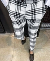 Detailed close-up of men's slim fit black and white plaid trousers with premium texture - S / Black White Grid (XFK13)