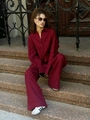 Detail shot of wine red cotton linen lounge set featuring loose shirt and wide trousers - S / Top And Bottom / Burgundy
