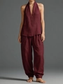 Detail of burgundy two-piece set featuring halter neck top and loose cotton linen pants - S / Burgundy