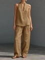 Detail of camel linen sleeveless halter top and wide leg pants set with breathable texture - Caramel color