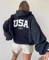 Detail view of oversized black hoodie featuring bold white USA 1984 graphic on the back - S / Black