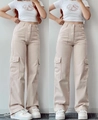 Detailed view of functional flap cargo pockets on beige high-waist straight pants - S / Apricot
