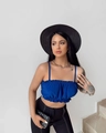 Detail of royal blue ruffled crop top with elastic shirring and gold chain necklace - S / Blue