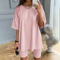 Conjunto de dos piezas rosa para mujer con camiseta oversize y mallas cortas tipo biker - S / Rosa