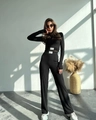 Detail shot of black ribbed knit two-piece set with a woven 'New Design' logo tag - S / Top And Bottom (CL-TZ23003) / Black