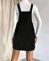 Detail view of the black corduroy dress back and white ribbed knit sweater fabric texture - S / Black