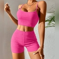 Detail of rose pink ribbed knit two-piece set featuring camisole crop top and high waist shorts - S / Top And Bottom / Rose Red