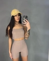 Detail view of the ribbed fabric on a dark khaki two-piece yoga set with crop top and shorts - S / Top And Bottom / Camel